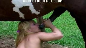 Awesome blonde with big boobs likes filthy bestiality with a horse