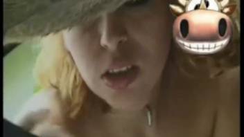 Attractive young blonde lady gives oral pleasure to a horse