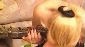 Pair of ladies nibbling on that serpent's rear and alluring it