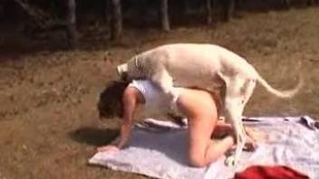 Finger fucking leads horny woman to having sex with a dog