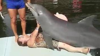 Cuban granny gets dry-humped by a prankster dolphin