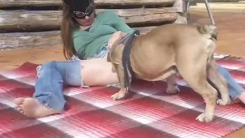 Small-breasted babe getting fucked deep by a dog
