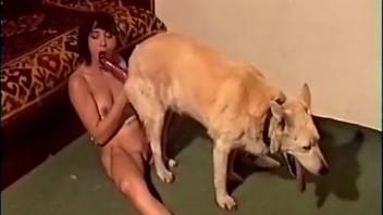 Slender girl applying her mouth techniques to satisfy a canine