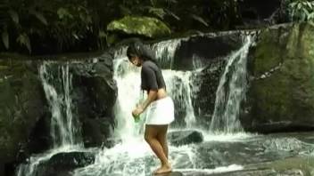 Busty natural-titted Latina being screwed near the waterfall