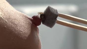 German mature woman climaxes as a bee stings her sharp nipple