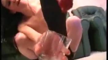 Dark-haired lady with tiny breasts screwing a well-hung canine