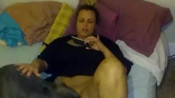 Plump bestiality-loving woman being tongued by a perverse animal