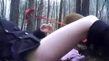 Canine tongues lady's vagina during outdoor bestiality fetish