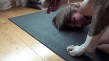 Anal sex video with a groaning dark-haired woman into bestiality