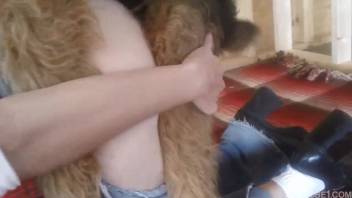 Slender woman roughly pounded by canine in her vagina amid intense bestiality session