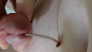 Amateur scenes with a man masturbating and holding a worm in his dick