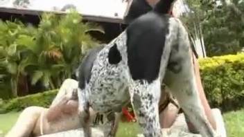 Horny mature moms sharing a genuine canine cock in a superb outside threesome