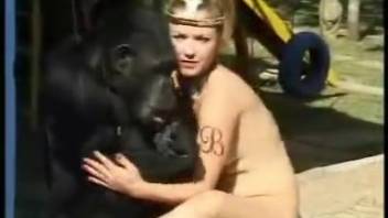Bare hottie is aggressively pounded by a chimpanzee in wild zoo action