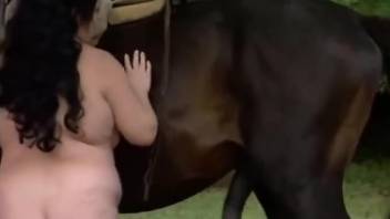 Naked BBW amateur worships horse cock outdoors